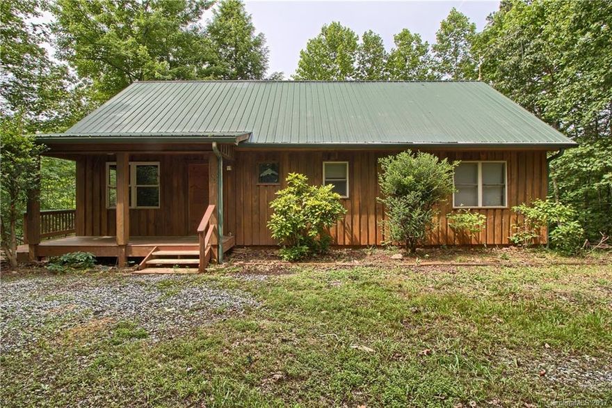 Lake front cabin with dock on Big Mirror Lake. Private gated community with reasonable HOA fees and plenty of amenities.  Perfect sanctuary for primary home, second home or investment. Wrap around porch.  Cathedral ceiling in living area.  Large kitchen. Flexible floor plan with 2 BR septic.  Use main level bedroom space as a master or as a study or family room. Second loft bedroom. New carpet on main. Gas logs. Rentals are allowed. Well maintained and pre-inspected.