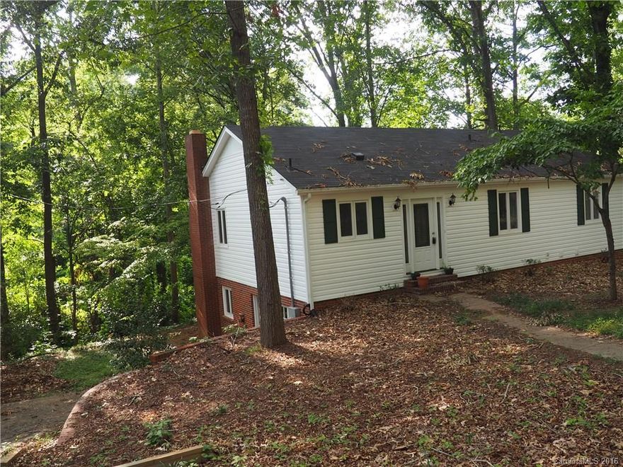 Remodeled inside & out. 4 br 3 ba home has new vinyl siding, roof, deck & an amazing kitchen w/granite countertops. 3 br 2 ba upstairs with a lg br and lg bath in bsmt. There is a great rec rm in basement w/fireplace and doors to walk outside. Come see the transformation.