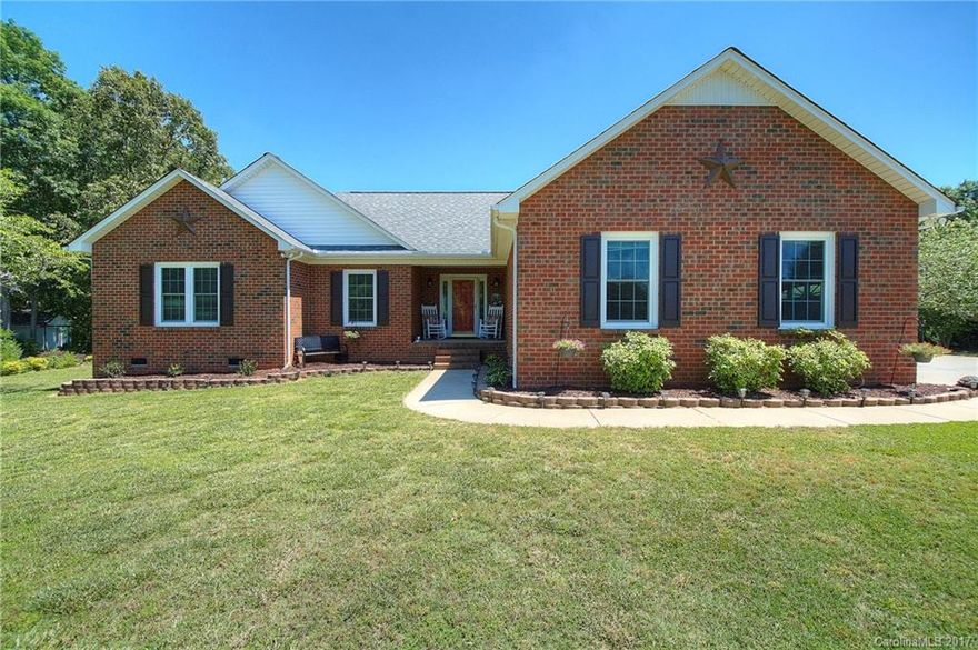 Full-brick ranch, 1.3 acre lot in quiet, small subdivision w/no HOA. Updated kitchen w/new granite countertops & tile floor, SS appliances, kitchen island, and eat-in area. Open floor plan w/hardwoods, vaulted ceiling, fireplace; new carpet in bedrooms. Beautifully updated baths. 1-year old above-ground pool (27') w/spacious deck for entertaining. 2 car attached garage PLUS detached 26 x 24 garage/workshop (wired), floored attic & lean-to for extra storage. Recent roof & windows. Don't miss!!