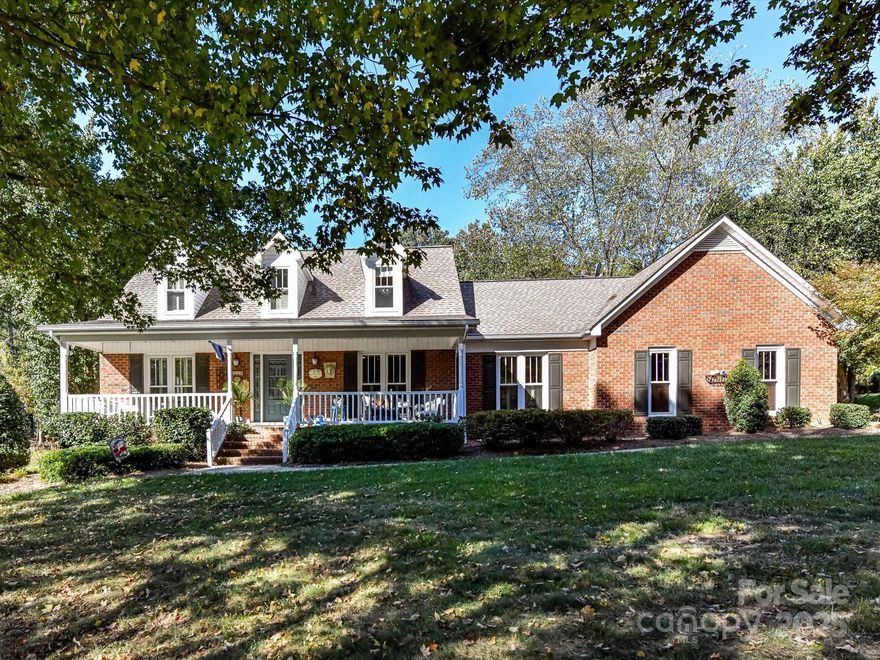 Have you ever wanted your own oasis? Welcome to 8320 Camelot in Harrisburg's premiere non-HOA neighborhood.  This custom built home sits on the most relaxing .65acres around. With a welcoming true rocking chair front porch to have coffee and wave to the neighbors.  Come in to the gleaming hardwood floors, an open family room and living room with a gas log fireplace with masonry surround and hearth, an Irish pub inspired bar with lighting, and French doors for more privacy when needed.  The dining room opens to the custom remodeled kitchen.  New cabinets with soft close and under cabinet lighting, tile backsplash, and a custom painted Kohler artist series farmhouse sink which inspired this entire renovation.  You simply must see it in person to appreciate it's beauty.  The owner's suite is on the main floor and has a beautifully remodeled en suite bath with walk-in closet.  Upstairs features three additional spacious guest rooms sharing a custom remodeled hall bath with stone floors, separate shower and garden tub also with stone surrounds, dual sink vanity with stone vessel sinks.
The true glory of this house is the backyard.  With the two tier deck, the patio with a fire pit, the saltwater pool with sunbathing deck and pebbletech finish, the hot tub hidden behind the pool (functions properly but sold as-is), and the pool house.  Let me tell you about the Mermaid House.  If you had to get thrown in the "doghouse" this is where you would want to be!  This pool house would be a wonderful Air B&B with a full bath and ceiling fan.  
Now let's talk mechanics!  The crawlspace was encapsulated and conditioned in 2021. The roof replaced in 2010, gutters equipped with Gutter Helmet, HVAC upstairs was replaced roughly 6-7 years ago and downstairs 3-4 years ago and both are serviced twice a year.  Windows replaced in 2021The new Champion aluminum fencing was installed in 2023. The kitchen remodel was in 2015.  Pool was installed in 2010.  Mermaid House was added in 2013 and has a mini-split HVAC.  Landscaping beds around the house have drip lines through them for irrigation.
Did I mention the schools?  Hickory Ridge, Go Bulls!