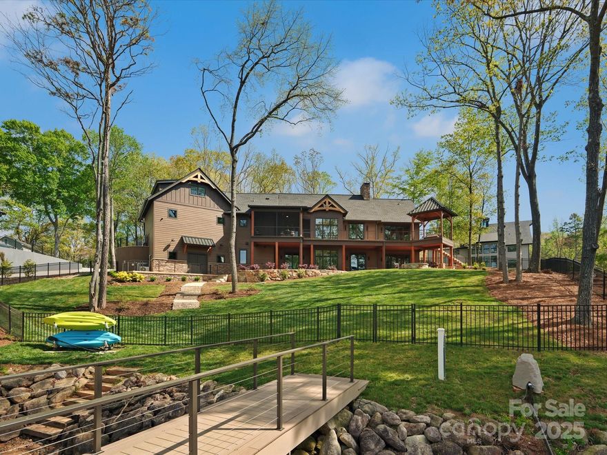 Welcome to your dream waterfront sanctuary on Lake Norman, where luxury meets nature in this exquisite custom timber frame home.Located in a vibrant area poised for growth, the future expansion of Hwy 150 promises increased accessibility and future value. An expansive open floor plan features soaring ceilings and abundant windows that flood the space with natural light, showcasing stunning lake vistas. Every inch of this home has been meticulously crafted and elegant living areas seamlessly flow to outdoor spaces, including a private dock, screened porch, and firepit. Retreat to the sumptuous master suite, complete with a spa-like ensuite and rear porch access overlooking serene waters. Additional bedrooms offer ample space for family and guests, each ensuite designed with comfort and style in mind. With luxurious finishes, lush landscaping, and too many special features to list, this property is a true gem, offering an extraordinary lifestyle by the lake. Contact me today!