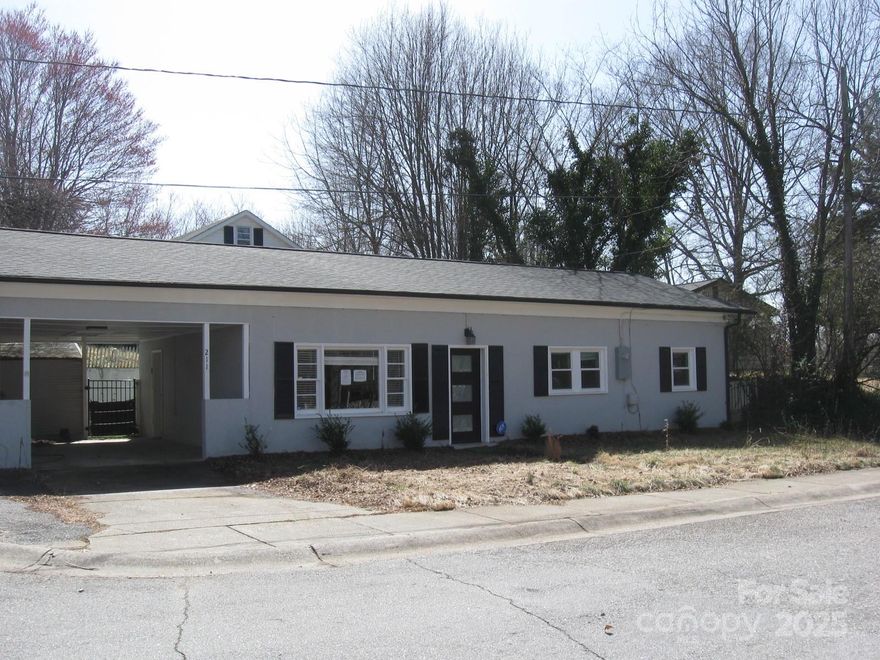Upgrades in include another small bedroom and another full bath. This house has new roof, flooring, windows, appliances. It is move in ready. Small lot with little or no upkeep to yard. Located really close to everything in North Wilkesboro Easy access.