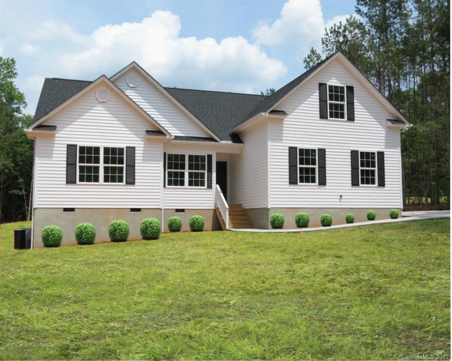 Beautiful 3BR/2BA home w/ a finished Bonus Room located in the Clover School District! This new construction home is nestled in among beautiful hardwoods for privacy & tranquility. Interior features a semi-open floorplan with a centrally located family room w/vaulted ceiling, fireplace & hardwood floors throughout the main living area. Kitchen features a breakfast bar, dinette & walk-out to a fantastic covered raised deck overlooking private backyard. Side-load garage! Completion date July 2015