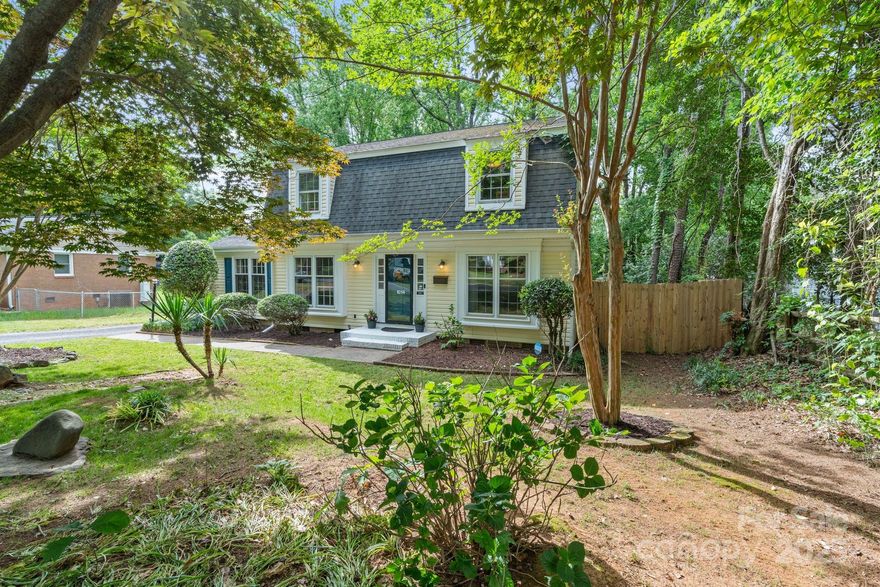 PRICE DROP and property qualifies for FTHB programs including a $20K grant with 100% financing, $10K grant with no PMI or a 100% financing no PMI option! A true hidden gem close to the city with a SPRAWLING, park sized backyard! This spacious 4 bed, 2.5 bath home features an updated kitchen, the coziest living room with a gas fireplace, dining room, and a guest bedroom/office with a full bathroom on the main level.  Primary bedroom with shiplap details and full bathroom suite. The masterpiece is your backyard space with an expansive deck, firepit area, basketball court, separate outdoor seating, and already wired for an outdoor kitchen. Been looking for a yard to put a pool in? This is it! Around the corner and short walk away, enjoy the newly revamped Coventry Woods neighborhood park with the most beautiful walking trail, playground, and big open area for picnics and play. Uptown is less than 15 minutes away!