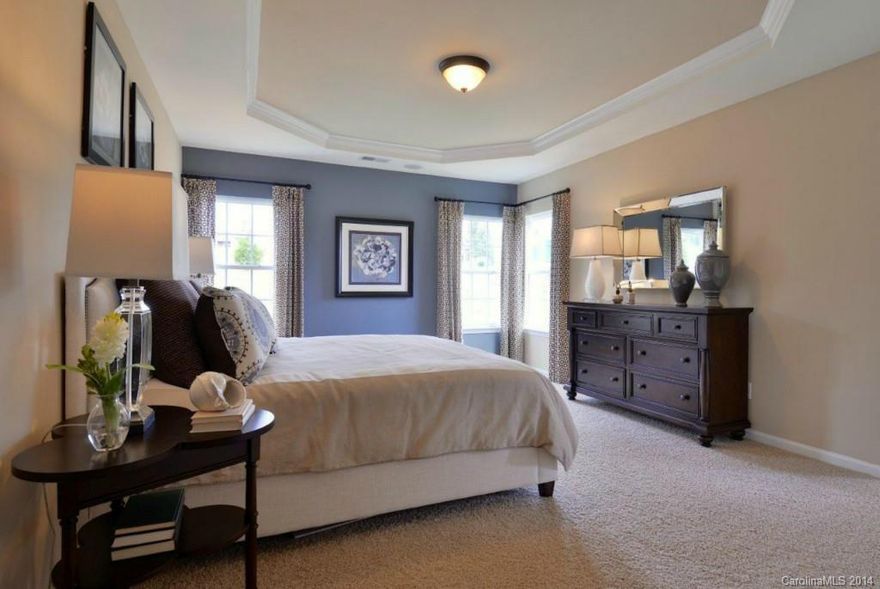 End stone town home featuring a first floor master bedroom, 2 bedrooms at second floor, loft, 2.5 baths, spacious great room, formal dining room, eat-in-kitchen, along with granite and an one car attached garage.  Many upgrades included.  Extensive amenities at Berewick. Town home to be built.  Cul-de-sac home site.