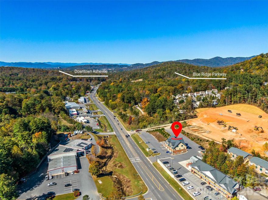 Rare opportunity to own a private, recently constructed modern office suite at 208 Charlotte Highway, Suite 301. Located on the third floor and serviced by an elevator, this thoughtfully designed space features a conference room, multiple private offices, reception area, storage, kitchen area, and year-round views. The property offers excellent accessibility just minutes from downtown Asheville, the Blue Ridge Parkway, I-40, and directly along US74A. Co-tenants include a surgical center and specialty veterinary clinic, creating a professional setting ideal for medical, wellness, administrative, or general office use. A rare Asheville area ownership opportunity in a convenient, high-visibility location.