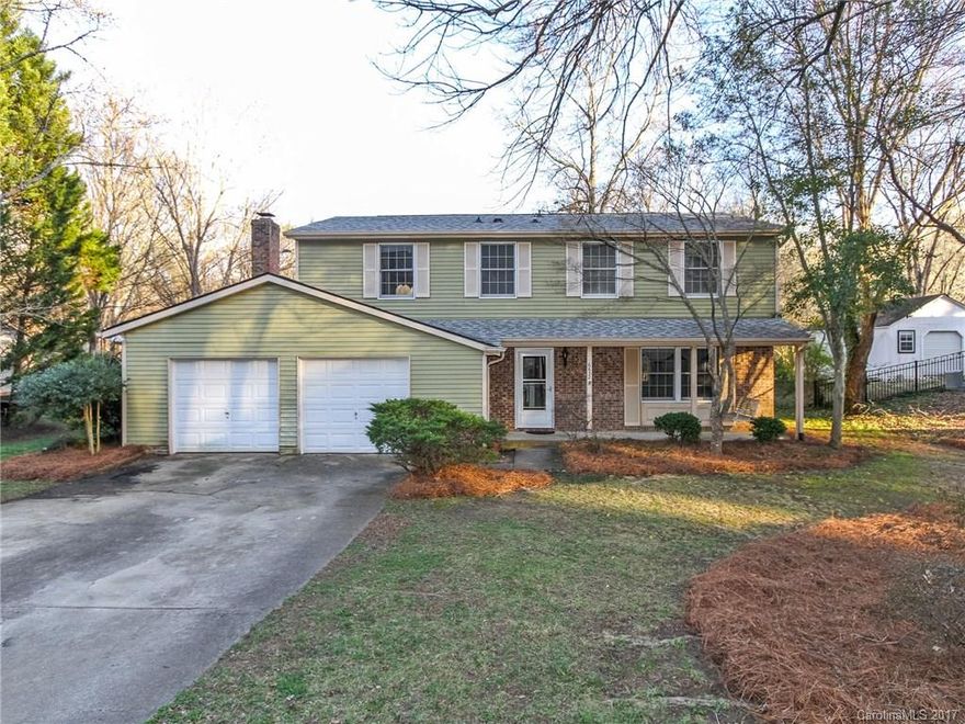 Move-in ready 2-story home with rocking chair front porch on a private lot. Main level features living and dining rooms, updated kitchen, and cozy den with fireplace and built-ins. Large patio off kitchen eating area opens to a fenced backyard with green space and walking trail beyond. 2nd floor has large master, updated master bath with heated floor and towel warmer, 3 additional bedrooms and 2nd full bath. Convenient to 485, Carolina Place, Arboretum, and SouthPark shopping and restaurants.