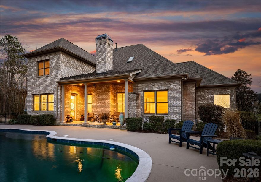 Welcome to 9200 Unbridle Lane, a true gem nestled in the prestigious Gated Providence Downs community of Waxhaw, NC. This stunning home perfectly blends timeless elegance with modern convenience, offering an unparalleled lifestyle in one of the area’s most sought-after neighborhoods.

As you approach, you’ll be captivated by the home’s stately curb appeal, complete with meticulously manicured landscaping and a welcoming front porch. Step inside, and you’re greeted by soaring ceilings, gleaming hardwood floors, and an abundance of natural light that flows effortlessly through the open floor plan. 

You will be pleased to find a fabulous home office with gas fireplace, built in bookshelves and natural light! 

The heart of the home is the chef’s kitchen, outfitted with top-of-the-line appliances, such as a Wolf Cook Top, custom cabinetry, and an oversized Quartz island perfect for gathering. The kitchen flows seamlessly into the spacious family room, featuring a cozy wood burning fireplace and large windows that frame serene views of the backyard oasis.

Retreat to the luxurious primary suite, nestled on the first floor, a true sanctuary boasting a spa-like bathroom with a soaking tub, dual vanities, and a walk-in closet that dreams are made of. Additional bedrooms are generously sized, offering comfort and privacy for family and guests alike.

Step outside to discover your private paradise. The backyard is an entertainer’s dream, complete with a covered patio and a sparkling Saltwater pool surrounded by lush and ample greenery. Whether hosting summer soirées or enjoying quiet mornings with coffee, this outdoor space is sure to impress. The Outdoor Fireplace is both cozy and relaxing! Seller has planted over $8k in additional trees for the ultimate private oasis! 

Living in Providence Downs means access to an array of amenities, including a community clubhouse, pool, tennis courts, and walking trails. Located just minutes from top-rated schools, upscale shopping, dining, and entertainment, this home truly offers the best of Waxhaw living.

Don’t miss the opportunity to make 9200 Unbridle Lane your forever home. Schedule your private tour today and experience the charm, luxury, and lifestyle this exceptional property has to offer!