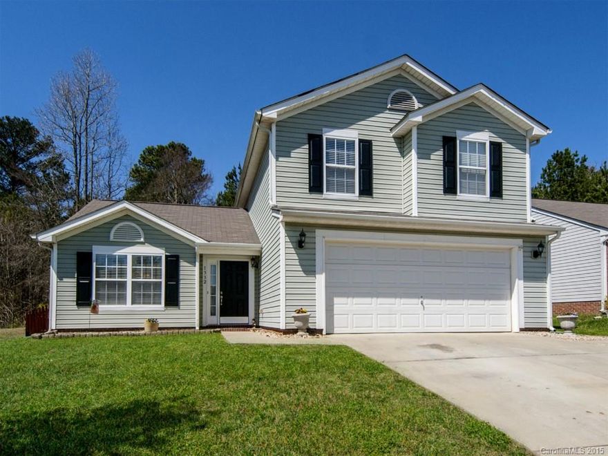 You will love this great home-  Open floor plan with beautiful floors.  Large kitchen with work island and stainless steel appliances.  Great room has tons of space for everyone.  Fresh neutral paint throughout the first floor.  Fully fenced back yard with wired workshop.