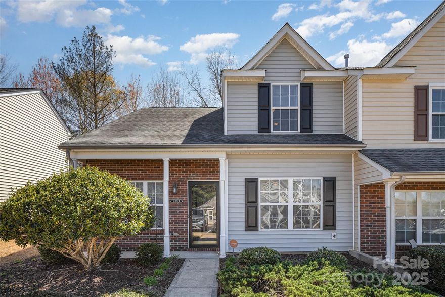 Welcome home to this inviting 3-bedroom, 2.5-bathroom townhome in the thriving Fort Mill/Indian Land region. Thoughtfully designed, it features all electric appliances, a primary bedroom with an en-suite bathroom on the main floor, and two generously sized bedrooms with a full bathroom upstairs. Enjoy all four seasons on your deck off the breakfast nook, overlooking a tranquil wooded space. High ceilings enhance the spacious feel of the home, making it seem larger than its footprint. Nestled in a peaceful, serene location, this community is situated across from CrossRidge Center, which will feature a Costco, Target, Lowes Foods, additional retail establishments, and apartments, promising continued growth and value for the future.