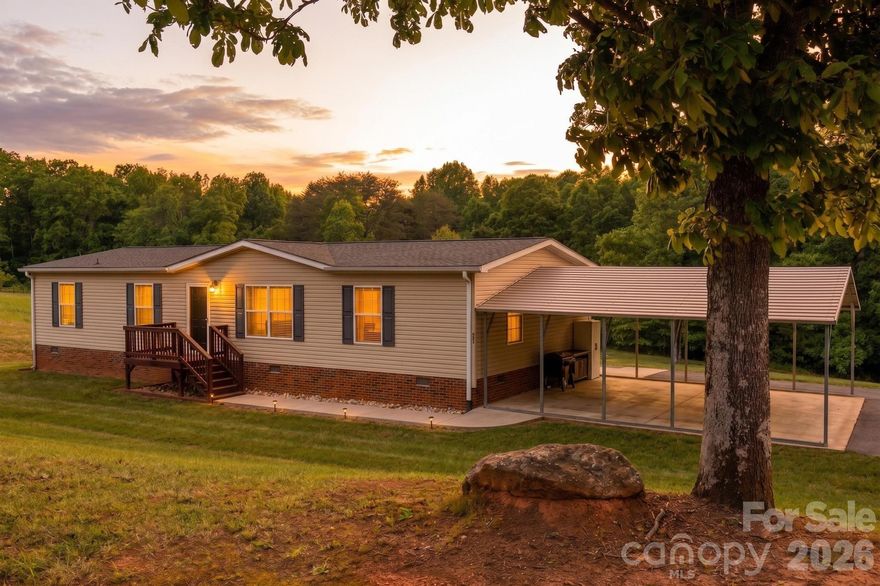 Welcome home to this well-maintained 3-bedroom, 2-bath home nestled on 2.88 private acres in Hiddenite, NC. Built in 2010, this move-in ready property offers comfortable one-level living with an extra living room and dedicated office space - perfect for working from home or relaxing in your own quiet retreat. 

The home features a 2022 roof, 2025 water heater, and an annually services heat pump, giving buyers peace of mind from day one. Powered 12x24 outbuilding conveys. The covered carport and paved driveway provide convenient parking, while the brick foundation adds lasting durability.