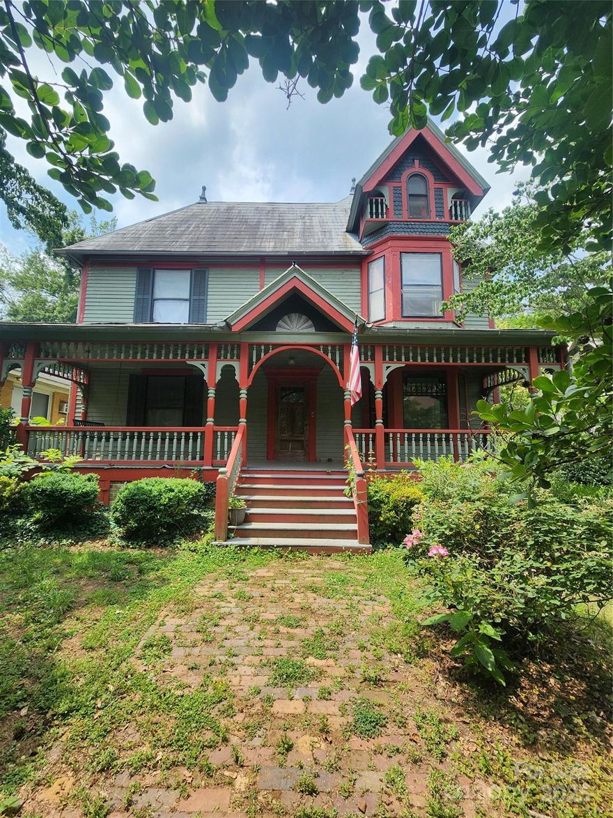 WHAT A GREAT DEAL! REDUCED PRICE BY $50k to $249,900. Welcome to The Gaskill-Blackmer 2.5 Story home in West Square Historic District. Buy at a great price, do your renovations & make it your own! Has lots of potential. Relax on the large covered front porch. Lots of original hardwood floors, 7 FP, could be up-fitted for use. 3 bedrooms/2 full baths. Could easily make more bedrooms if needed. Library w/ built in book shelves. Lots of unique features including the stair railing, several stained glass windows, 2 claw foot bathtubs, 2 wood seats in dormer area on 3rd floor looking out the window. Lots of childhood memories! Lots of storage! 3rd floor has wood slatted ceilings appx 949 sq'.  Roof may be leaking in several areas including front porch. Pieces of exterior wood siding has came off the right side of the home where the bar area is and water has leaked into that room and has biological growth on ceiling. TAKE MASK IF ANY CONCERNS. Lots of parking around back on the concrete driveway. Around the corner from Downtown.