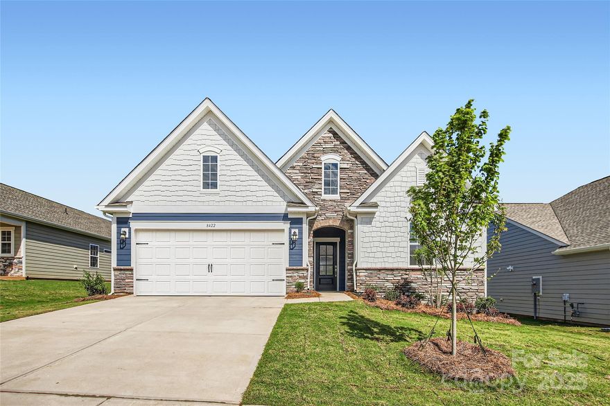 This new Bedford floorplan is a single-story home featuring an open-plan layout that flows seamlessly among the spacious family room, modern kitchen and sun-drenched breakfast room, which provides direct access to a covered patio. Flex space adds versatility. The owner’s suite and the secondary bedrooms are situated at opposite corners of the home for added privacy. Plus, our signature Everything's Included program means you will get a gourmet kitchen with double ovens and cooktop, quartz or granite kitchen countertops, subway tile backsplash, ceramic tile, luxury vinyl plank flooring throughout the home, and a gas fireplace (per plan). Roselyn is a master-planned community offering exclusive ranch homes designed for active adults. This community features an experienced lifestyle team and future resort-style amenities including a swimming pool, clubhouse, pickleball courts, fitness, tennis, bocce and multi-use trails connecting to the Carolina Thread Trail.