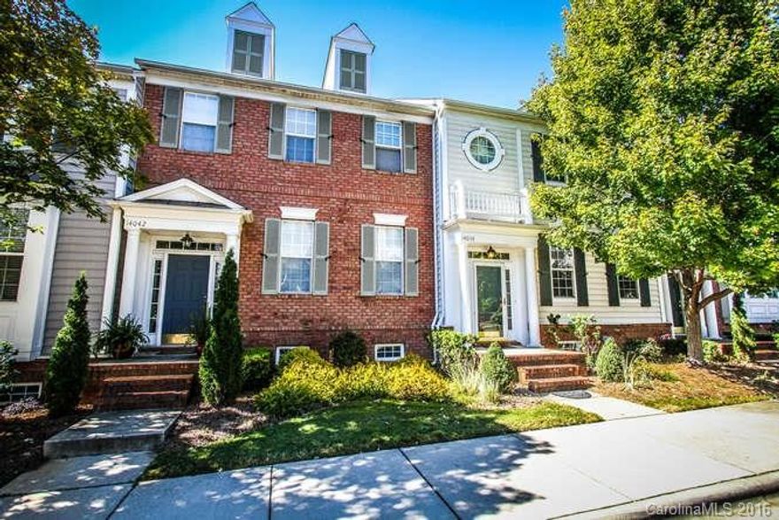 BEAUTIFUL Townhouse in Ballantyne Village where you have Restaurants, shops, theater, and gym in walking distance! Open floorpan with beautiful kitchen with island. Great room with gas log fireplace and beautiful hardwood floors throughout main area and large deck off of kitchen/dining area. 2 BR and 2 full baths upstairs and Rec/Bonus room with half bath on lower level along with 2 car garage. New roof in 2011 and a new HVAC in 2014.