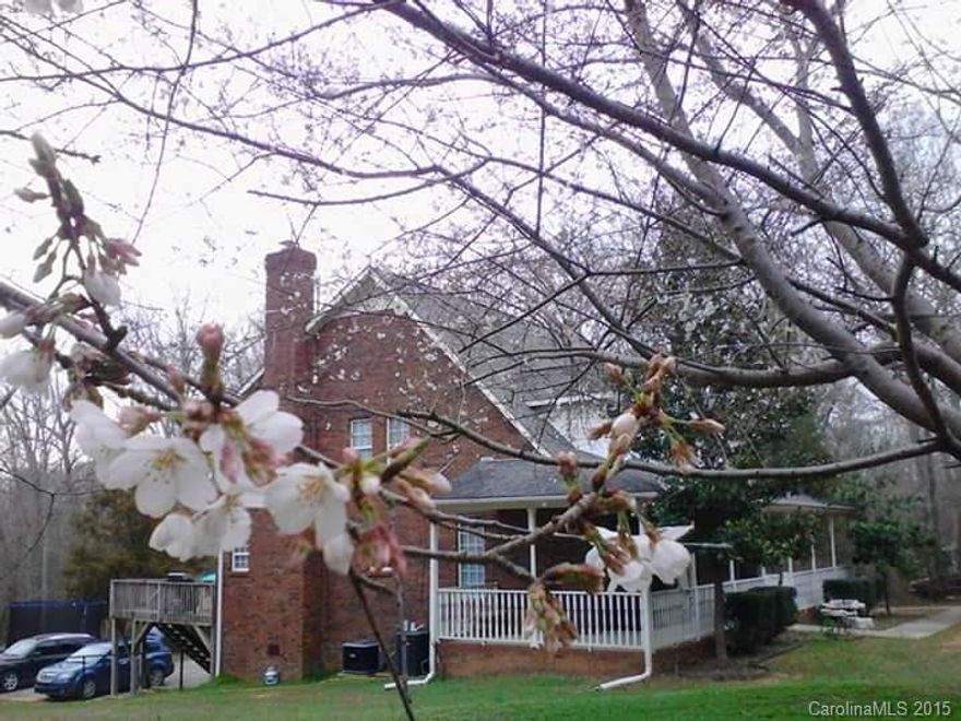 Big, Beautiful 5 BR/3.5 Bath with wrap around porch and large deck overlooking spacious fenced-in backyard! Brick fireplace with gas logs and Formal living room with vaulted ceilings. Huge Basement with full Bath,possible office & room for entertainment! Garage with Workshop. Large garden with playground. New, modern system air conditioning system with(Nest control). Awesome space inside & out. Heat Pump is 1yr old and has extended warranty. Awesome space inside & out.