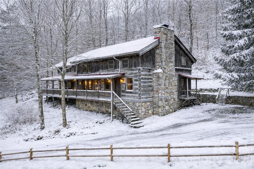 HUGE PRICE IMPROVEMENT – Happy Holidays from Serenity Lodge!
Ring in the New Year with your own mountain retreat at this spacious 3,400 sq ft rustic cabin, ideally situated above the ski slopes at Hatley Pointe, one of Western North Carolina’s hidden-gem ski destinations known for its scenic views, natural snowfall, and uncrowded slopes—perfect for winter sports enthusiasts and year-round mountain lovers alike.

This inviting cabin boasts two stunning fireplaces, a welcoming covered front porch, and an abundance of natural light throughout. Offering 2 bedrooms plus bonus rooms and 2 full bathrooms, the layout provides flexibility for guests, hobbies, or additional sleeping areas. Step outside to enjoy the built-in outdoor firepit, ideal for crisp mountain evenings and entertaining under the stars.

Located within the desirable Wolf Laurel community, residents enjoy access to a wide range of amenities including skiing, golf, tennis, hiking trails, and breathtaking mountain views, all within a gated mountain setting. Wolf Laurel is known for its four-season appeal, strong sense of community, and convenient access to nearby towns while still offering privacy and tranquility.

Whether you’re seeking a primary residence, vacation getaway, or investment opportunity, this mountain cabin delivers space, charm, and an unbeatable location.