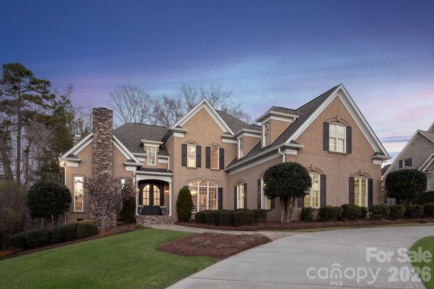 Discover refined living in this custom luxury residence located in Highgate, on of South Charlotte's most desirable communites. Set on over one acre of private, natural surroundings, this home combines quality craftsmanship with an exceptional location and just minutes from top-rated schools, dining, shopping, and recreation.

A thoughtful floorplan showcases rich trimwork, high ceilings, and floor-to-ceiling windows that fill the home with natural light. The updated 2026 kitchen features quartz counters, a new backsplash, and freshly painted cabinetry, opening seamlessly to the main living areas for effortless everyday living and entertaining. The family room includes a fireplace, new lighting, and freshly painted built-ins, with direct access to the screened porch overlooking the quiet, fenced backyard.

The main-level primary suite offers a spacious retreat with a tray ceiling, new lighting, large walk-in closet, and a well-appointed bath with separate vanities, a soaking tub, and ample storage. A cozy office/den with fireplace and an elegant dining room with wainscoting complete the main level.

Upstairs, you’ll find generously sized bedrooms, two full baths, and versatile flex space, all freshly painted.

Additional highlights include a circular driveway and three-car garage, enhancing both convenience and curb appeal.

This Highgate home delivers luxury, comfort, and privacy in a premier location.