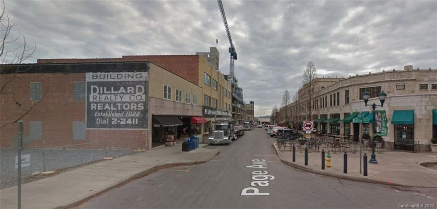 Centrally located commercial building right across from the historic Grove Arcade with heavy foot traffic. Long term tenant leases nearing expiration; ideal for redevelopment. Hotel Cambria being built on corner of Battery Park and Page Ave with 136 rooms - opens 2017. Area in rear of building used for parking; see survey. Building could hold up to 2 more floors per previous structural consulting.