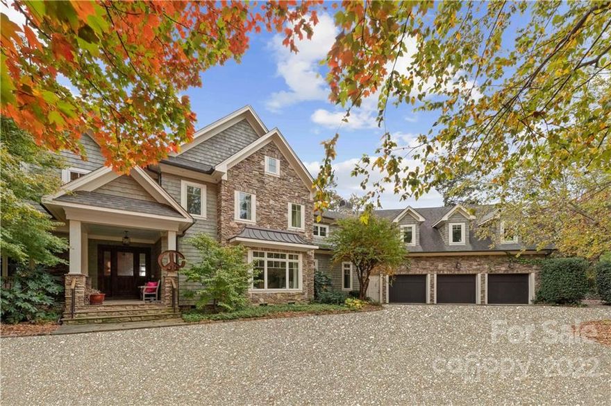 One of Lake Norman's quintessential Nantucket style waterfront estates. This classically designed home exudes casual elegance with refined craftsmanship. Private gated entry. Gracious flow throughout with an open layout for entertaining & spectacular lake views from all rooms. Gourmet kitchen features an expansive wood island & custom iron light fixture as the centerpiece, well appointed for the most discriminating chef. Lakeside entertainment room opens to the veranda with wood burning fireplace. Infinity pool with spa. Primary retreat has a lakeside balcony, morning kitchen, spacious bathroom & dual closets. Private guest apartment with full kitchen, two sitting areas, built-in bookshelves, full bath, walk-in closet & balcony with stairs to the lakeside lower level. Additional 3 upper level guest bedrooms, exercise/bonus room, massage & powder room. Three car oversized garage with electric vehicle charging system, epoxy floors, additional laundry area, built in cabinets,&  generator.