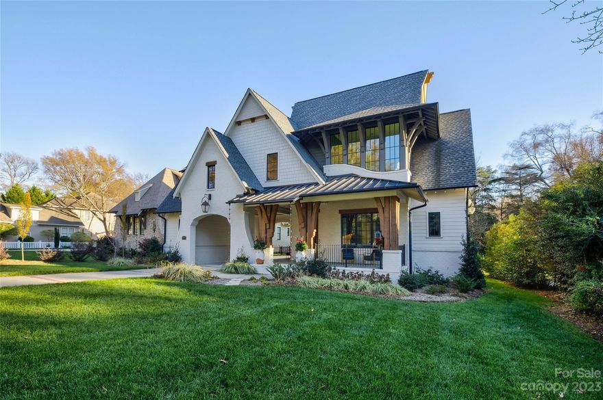 4028 Churchill Road is a true embodiment of modern luxury and sophistication. Boasting remarkable architecture and curb appeal, including a porte-cochere, wrap-around front porch, metal roof accents, and a striking waterfall window, this home is a visual delight. Inside you will discover a smart home where every detail has been meticulously considered. The chef's kitchen is a culinary dream with custom locally crafted cabinetry, a 48" duel fuel range, a walk-in pantry, and a scullery complete with a second dishwasher, wine fridge, and handcrafted wine racks. The living room exudes warmth with a cozy gas fireplace adorned with an Italian tile surround. The primary bedroom graces the main floor offering a private sanctuary. The screened-in porch with a second gas fireplace and mounted Infratech heaters provides a serene retreat overlooking the expansive yard space, perfect for year-round enjoyment. This home redefines luxury living with its chic, modern, and celebratory allure.