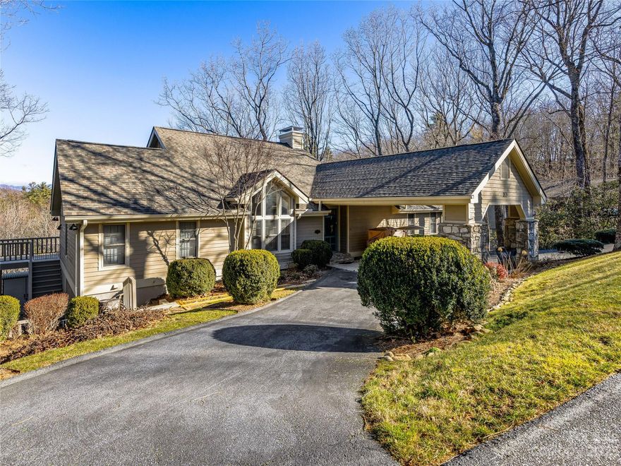 This 3 bedroom, 4.5 bath home boasts unparalleled views of Toxaway Mountain, Panthertail, Little Panthertail, and Cold Mountain. Located in the Club Colony community, enjoy easy access to the marina, the Greystone Inn, and Lake Toxaway Country Club (membership is based on application and availability). Step inside this mountain retreat into the main living space featuring a gas fireplace, natural lighting, and access to the covered portion of the outdoor deck with a ceiling fan for summer days. The kitchen is equipped with stainless steel appliances and granite countertops. The main level also features two primary bedrooms with outdoor deck access, a spacious laundry room, and an updated powder room. Once downstairs, enjoy another living space with a gas fireplace and access to the lower outdoor deck, a wet bar, the third bedroom, and a versatile bonus room. Stay connected to the outdoors with stunning panoramas and the mountain serenity this home has to offer.