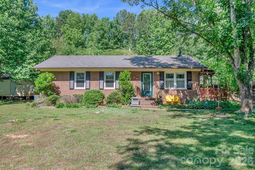 Welcome to 4806 John Craig Road, a cozy and comfortable home located just outside Waxhaw town limits.  One acre of fenced in privacy awaits its new owner.  The interior of the home features 3 bedrooms, 1 bath with laminate flooring and fresh paint.  A charming woodstove can convey with the sale.  Outdoor living extends from the main living space to a covered porch overlooking a spacious and partially shaded yard.  A storage room with power is an added bonus, plus a covered parking and/or storage area.  The fully fenced in yard provides the benefit of having full use of the entire acre while ensuring security and safety!  The locating is ideal, allowing easy access to local amenities while enjoying a little elbow room and freedom.  Call today to schedule your tour.