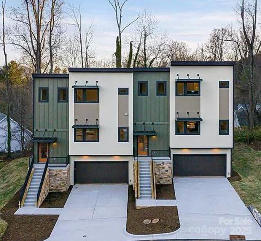 Discover the perfect blend of urban sophistication & mountain tranquility in this stunning modern townhome just minutes from downtown Asheville. This prime location has quick access to downtown Asheville's vibrant restaurants, breweries, mall, & more! Open & spacious kitchen/dining/living floor plan with lots of light.  This three-story home has been elegantly designed, featuring an owner's suite w/ a spacious walk-in-closet & beautifully designed en-suite bath, ground level patio, 2nd floor covered deck, and third floor balcony/terrace, private 2-car garage, and a builder warranty! Rare opportunity to own a luxurious, low-maintenance home in one of North Carolina's most sought after areas. Please note: pictures in this listing are of another townhome similar to this one. Fixtures/cabinets/tile/flooring may be different in unit being built.