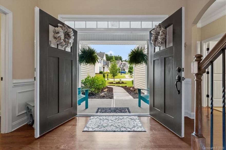 This charming 1.5 story home in Walnut Creek will captivate you the instant you arrive at it's spacious front doorstep with a modern double door entryway. The moment you enter this 5 bedroom 3.5 bath home with 10ft ceilings, crown molding and wainscoting, you'll instantly be drawn to walk through the arched entryway into the open living space bursting with natural light. This home features wood floors, a fireplace, an open kitchen with granite counter-tops, a peninsula, an island, double ovens, a gas cooktop, stainless steel appliances and a breakfast nook. Three of the bedrooms can be found on the first floor, one being the master bedroom, which includes a beautiful coffered ceiling, double vanity, seamless glass walk-in shower, deep soaking tub and a large walk-in closet. Upstairs includes two bedrooms and a full bathroom. Enjoy the luxurious outdoor living space with a large covered patio that extends out to the outdoor kitchen with a fenced in backyard that backs up to the woods.