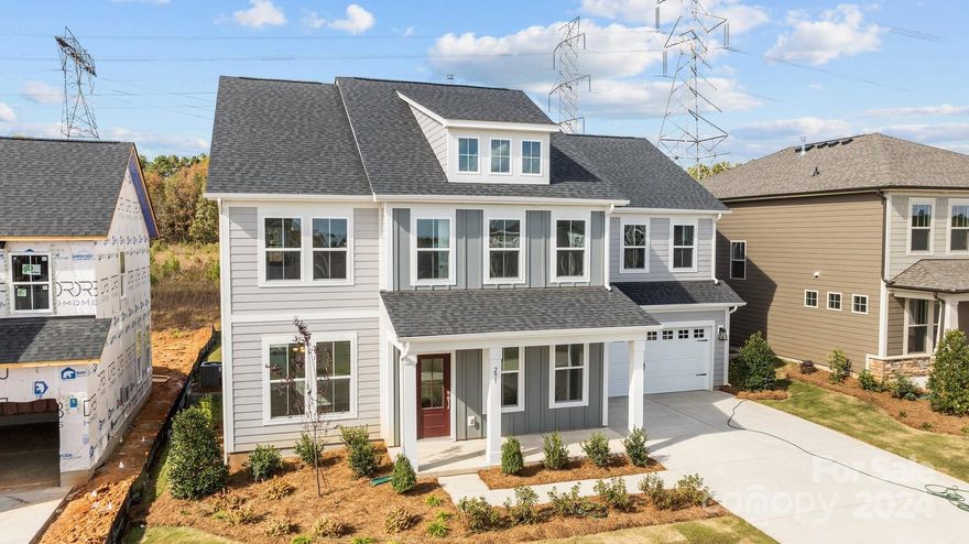 Welcome to Lakeside Glen & the popular Townsend plan! This 3,501 sq ft home offers 5 bedrooms, 4.5 baths, w/ numerous upgrades. The open-concept layout includes LVP flooring on the main level, a gourmet kitchen that includes stainless steel appliances, a 5-burner gas cooktop, wall oven, quartz countertops, plus a large island perfect for social gatherings. The main floor also showcases a dining room w/ a coffered ceiling, a large family room, a first-floor guest suite w/ a private bathroom, and a private study. The second floor includes a luxurious primary suite w/ a tray ceiling, dual-sink vanity, tiled shower w/ a seat, & the walk-in closet has direct access to the laundry room. Bedrooms 3 and 4 share a connecting bathroom and all secondary bedrooms include walk-in closets. Enjoy the outdoors w/ both a welcoming front porch and a generously sized rear covered porch, just a stone's throw   from the newly renovated Allison Creek waterfront park!