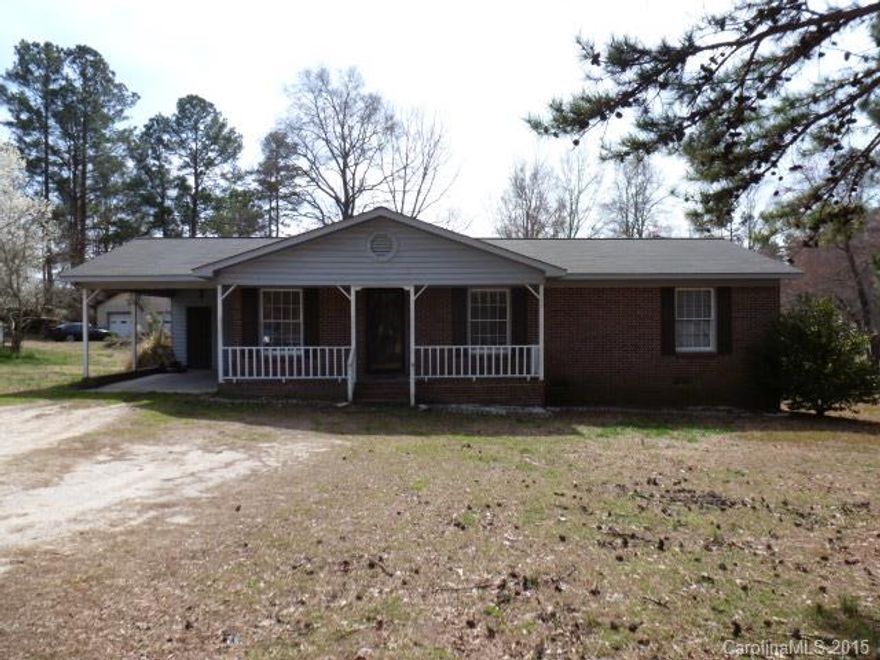 Perfect for the first home buyer, located in the McDonald Green School district. Ranch home has laminate flring throughout except baths. Den is cute. Nice kitchen, 3BR's 1.5BA's, laundry room inside, single carport w/storage and detached storage bldg. Above ground pool being sold "As Is" no value.