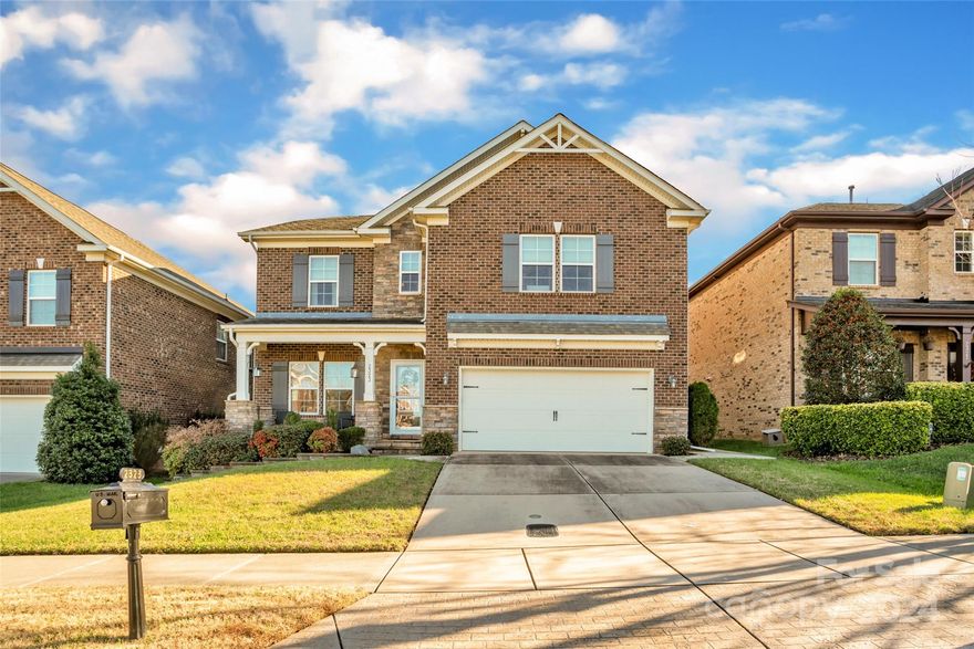This is the one you've been waiting for! This beautifully maintained home in desirable Christenbury Village is an entertainer's dream. A bright, airy dining room awaits as you enter, featuring coffered ceilings and extensive molding throughout. The kitchen has it all, including an eat-at island, ss appliances and breakfast nook, along with access to the screened porch, perfect for enjoying fresh air + the view beyond your fenced backyard all year-round. The light-filled living room is open to the kitchen and breakfast area, and features a cozy fireplace + access to a patio any grill master would love! An ultra-convenient home office/flex room and powder room complete the downstairs. Upstairs you'll find the primary retreat, complete with huge walk-in custom closet, dual vanity, tub + separate oversized walk-in shower and water closet. Three additional bedrooms, a laundry room and a generously sized loft space round out the second floor. Don't miss this one!