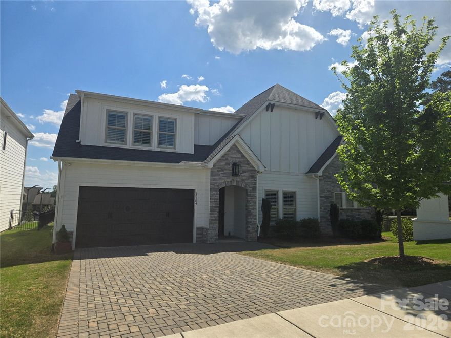 Immediately upon entering you feel the warmth and high end quality of this gorgeous Custom built home. The open first floor living is enhanced by plate glass windows capturing the expansive views and invites one to the stunning outdoor living area that rivals this home's inside features. A detailed home feature list will be added in the attachments. The HOA includes year round yard maintenance and homeowners enjoy a Social membership to the Palisades Country Club where tennis, pickle ball, fitness and swimming facilities are included in the lifestyle found in this intimate community. This is a truly an exceptional property and community.