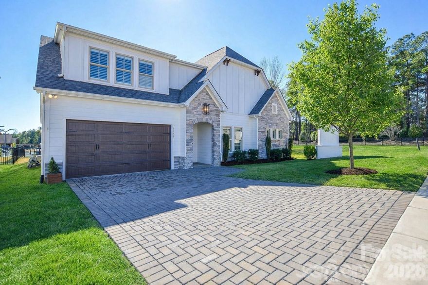 Immediately upon entering you feel the warmth and high end quality of this gorgeous Custom built home. The open first floor living is enhanced by plate glass windows capturing the expansive views and invites one to the stunning outdoor living area that rivals this home's inside features. A detailed home feature list will be added in the attachments. The HOA includes year round yard maintenance and homeowners enjoy a Social membership to the Palisades Country Club where tennis, pickle ball, fitness and swimming facilities are included in the lifestyle found in this intimate community. This is a truly an exceptional property and community.