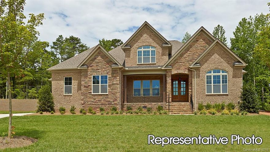 .34 acre, corner lot, 1.5 story home will impress. All Brick, 3 car garage drive way and a master on the main, guest suite on main,10 ft ceilings 1st fl, 9 ft on second. Panoramic try fold door opens to large back yard, tankless water heater, fully sodded & irrigated yard, hardwood flooring on the 1st floor main areas and hallway of the 2nd, Mahogany front doors, granite, 16 Seer Carrier HVAC system, r38 insulation in the ceilings, Anderson line Low E windows, and radiant barrier roof sheathing.