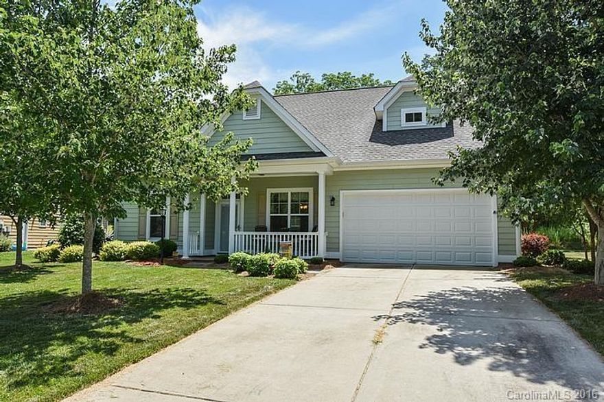 Gorgeous ranch home in pristine condition. Beautiful open floorplan. Wonderful kitchen with 42" cabinetry, SS appliances, granite counters, & maple cabinetry. Nice hardwood flooring.  Vaulted ceilings in great room and tray ceilings in master bedroom.  New roof - 2014 and new carpet throughout.  Generous stone paver patio in rear for great entertaining. Nice, level lot with privacy.
