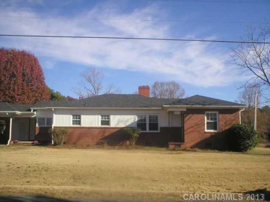 Ready to move in condition.  Well kept, recently new roof, gas pack, stainless steel Ref., Range, Dishwasher.
Built in storage in Den, Carport also has Garage/Shop and Outbuilding.  Outside stairs leading down to cellar storage. 

One Year home warranty available.