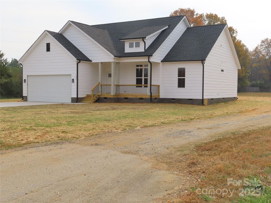 Sitting on 1 acre and with no HOA or restrictions. Bring your camper, boat, etc.
New construction with taller ceilings, gas heat, gas range, pot filler and a large pantry & laundry room. House has front and back porches and no carpet.