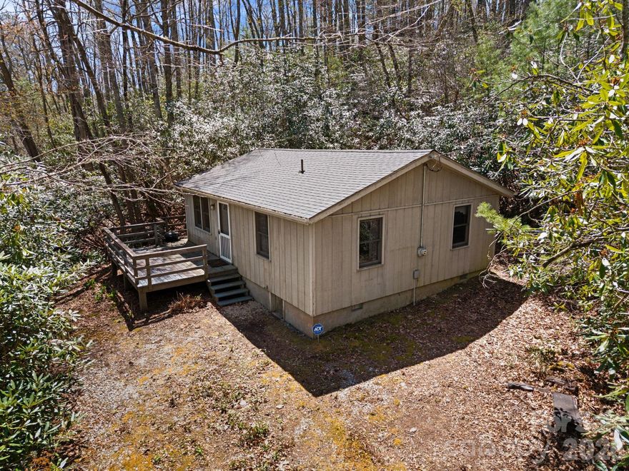 Tucked into a quiet wooded setting, this 2-bedroom, 2-bath mountain cabin offers the kind of peace and reset people come to the High Country for.  Just off the Blue Ridge Parkway, one of the most scenic drives in the country, with easy access to overlooks, hiking trails, and seasonal foliage. Surrounded by trees and the soft sounds of nature, it feels removed in the best way…a place where mornings are slow, coffee tastes better on the porch, and the pace naturally shifts.