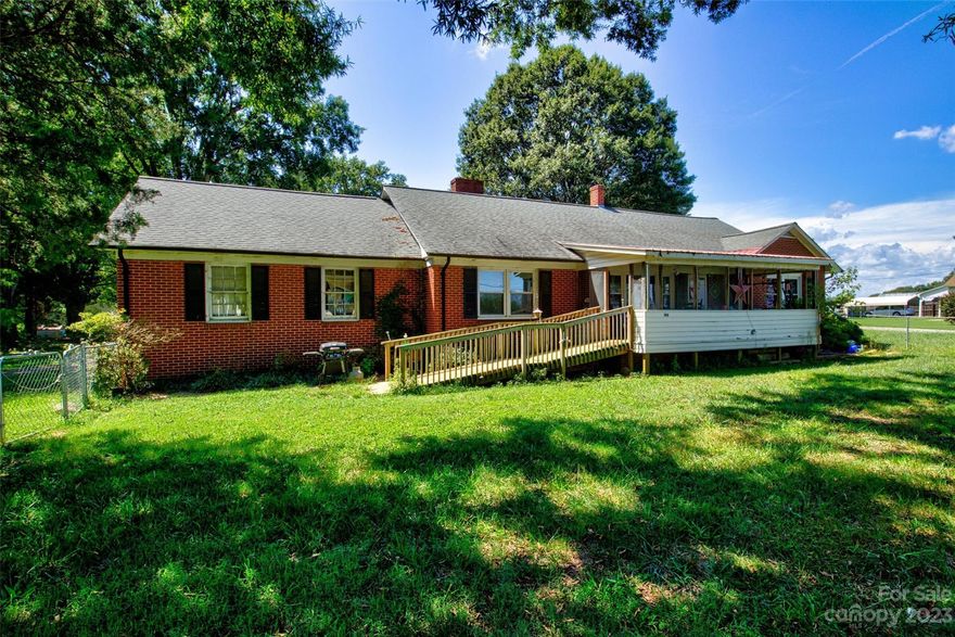 Single level of living on over an acre of level property with NO HOA! This house is for you!! House was totally remodeled 8 years ago with new HVAC, water heater, bathrooms, roof, hardwoods, ceramic tile and upgraded electrical. Majority of windows and septic were installed 4.5 years ago.  Large kitchen w/island, quartz counter tops, formal DR with fireplace. Front and back porches are handicap accessible. Driveway circles behind house to garage entrance.