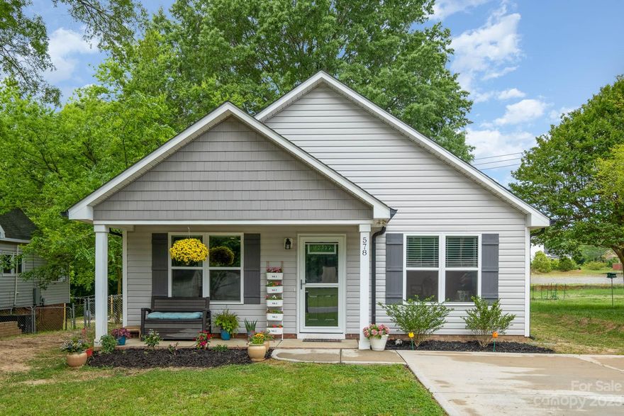 Welcome to 578 Main Street SW in Concord! Step inside and be greeted by the stunning luxury Vinyl flooring that spans throughout the main living areas, creating a seamless and visually appealing atmosphere. The open concept layout seamlessly connects the living room, dining area, and kitchen providing the perfect space for entertaining family and friends. The kitchen is a chef’s delight, boasting sleek stainless steel appliances. One of the main highlights of this property is the expansive backyard, perfect for outdoor gatherings, gardening, or simply enjoying the Carolina sun. The detached workshop provides an ideal space for hobbies, projects, or even transforming it into a home office or studio! Don’t miss the opportunity to make this extraordinary home your own. Schedule a showing today!