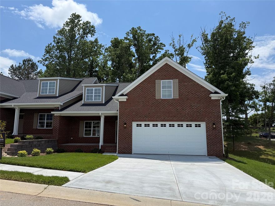 Don't miss one of the last two NEW CONSTRUCTION brick townhomes in the beautiful Magnolia Plantation! With 3 bedrooms, 2 baths, and an open floor plan, this home checks all of the boxes. A covered rocking chair front porch welcomes you into the large vaulted ceiling family room, dining area, and kitchen with breakfast bar. Beautiful finishes including quartz countertops, custom backsplash, stainless steel appliances, and high end cabinetry. Primary bedroom has tray ceiling and en-suite bathroom with dual vanities, spacious tile shower, and large walk-in closet. Second bedroom with a view of a small pond and additional hall bathroom on main level. Upstairs is a 3rd bedroom to be used as you wish! Large, partially covered Trex deck off the kitchen for great outdoor living. Also, there is a Rinnai tankless water heater for on demand hot water. Check out the completely finished garage - North Point Custom Builders overlooks no detail! Great location close to Hwy 74 and Uptown Shelby!