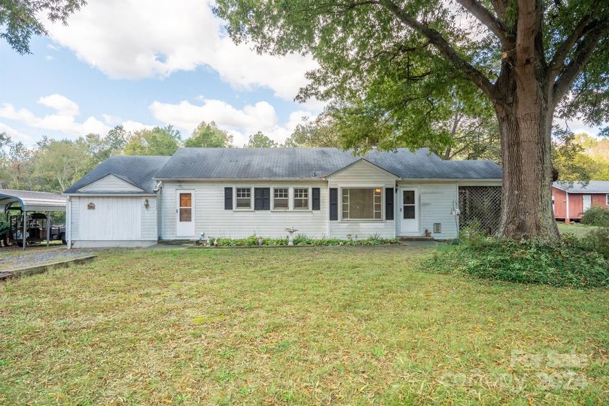 This fantastic investment opportunity has three individual lots: a garage/workshop with storage, a home needing some TLC (flooring, paint, windows, and roof) perfect for rental or renovation, and an additional lot ready for new construction. The property is partially fenced with a small barn, ideal for farm use, and includes a spacious workshop for equipment storage. Perfect for those looking to customize and add value!