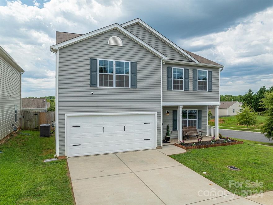 Don't miss this fantastic opportunity in the highly sought-after Spencer Mountain Village neighborhood! This well-maintained 4-bedroom, 2.5-bath home is priced well below tax value. Enjoy amenities including a pool, playground, and walking trails. Conveniently located near shopping, Charlotte Douglas International Airport, freeway access, and dining options. Make this rare opportunity yours today!