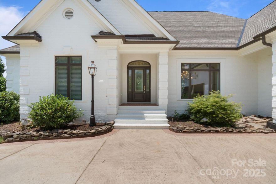 Beautifully renovated golf course home with added square footage, including a new bedroom and full bath. Thoughtfully reimagined with elevated finishes throughout, this turnkey property offers modern comfort, expansive fairway views, water views of Lake Norman, and a prime location within walking distance to The Peninsula Club.