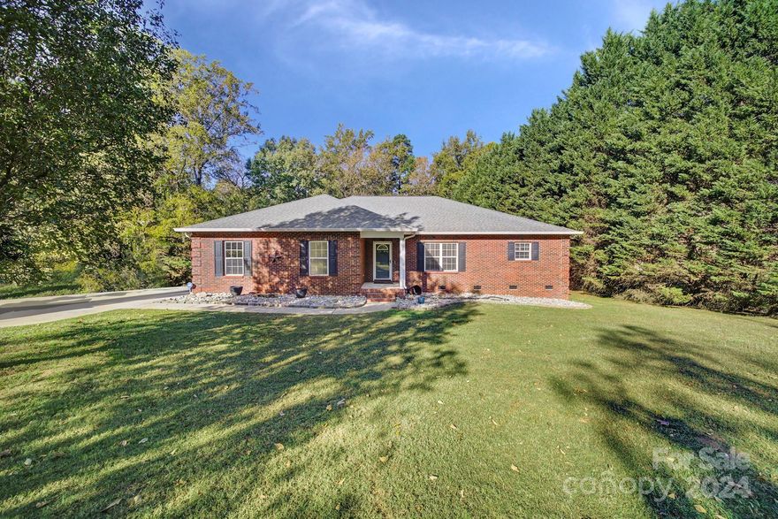 Property back on market no fault of seller.  Welcome to this beautiful, all brick, ranch home that is move-in ready on a 2 acre lot.  This home comes with all wood floors, stainless steel appliances and a huge workshop with 50 amp service. Inside you will find a large eat-in kitchen with beautiful, granite countertops and an abundance of cabinets. You will love the gorgeous barn doors that opens to the  family room/sun porch.  Relax in the large living room that comes with a gas fireplace and cathedral ceilings.  A sizeable backyard is ample enough to put in an inground pool. You will love the peace and tranquility of this location! You will be just minutes away from local amenities like shopping, dining, health/fitness centers, hiking, parks, lake activities and Charlotte airport. No HOA & SC low property taxes are a big plus. Award winning Clover schools.