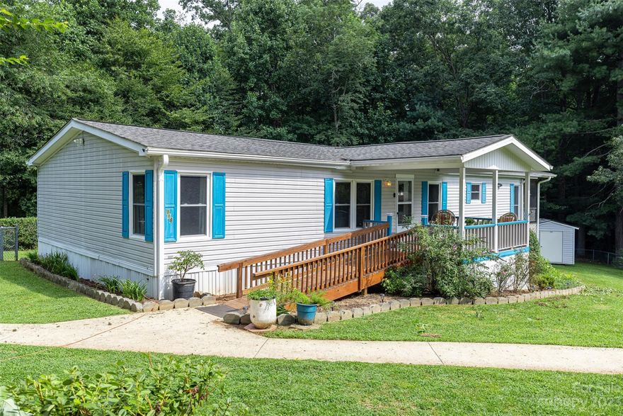 This lovingly maintained 3 sleeping rooms/2 bath home has been updated with fresh paint and new carpets throughout and stainless kitchen appliances. Enjoy one-level living with a wheelchair access ramp and a bright, open floor plan. Cozy up to a fire - inside or out - in the family room or in the level, fenced backyard. With two sheds for storing gear and lawn equipment, raised garden beds and fruit trees, Concord grape vines and blackberry bushes, experience the best of outdoor living! The expansive screened porch is perfect for bird watching or catching glimpses of deer and white squirrels. *We have received multiple offers. Call for best offers by 10am on Tuesday, August 15.*