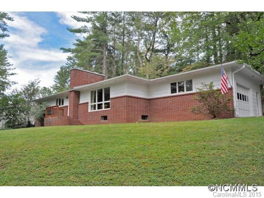 Classic rancher, prime location! Beautiful hardwoods, good-sized bedrooms, tile baths. Gorgeous living room w/fireplace. Kitchen skylight brightens great, renovation-ready space. Main level garage/workshop. 800 s.f. storage in basement. HVAC new in 08. Well-maintained exterior paint and brick, newer roof, Anderson windows. Sited above road w/partial-fenced yard, this house has more than good bones. It's the perfect canvas for your vision of home!