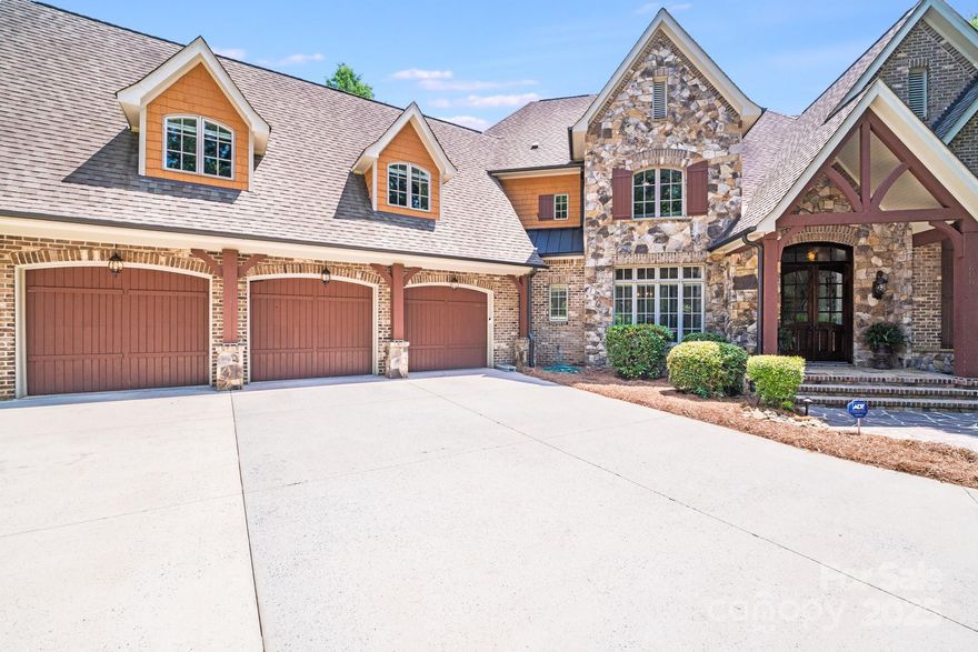 This show stopper in the highly desired gated community of Chatelaine will certainly not last. As you enter the grand foyer, you are greeted with soaring ceilings, expansive windows & grand curved staircase. Your dedicated office flaunts custom wood work & fireplace. Kitchen gleams with granite countertops, double oven, Viking gas range, pot filler, walk in pantry, wine closet, tons of cabinetry, with adjacent keeping room, making this a true culinary playground! Entertain guests in the formal living room against the backdrop of your private backyard oasis, featuring an impressive stone fireplace & wet bar with wine cooler. Each bedroom is an individual sanctuary with full private bath. Primary ensuite is pure opulence. Large bonus room boasts a full bar. The real magic occurs outside with a large covered patio & gorgeous pool. Top tier Schools, Cat 6 wired, Electric vehicle charger, tray lighting, walk up attic & custom built-ins!  Chatelaine is not just Luxury, it is a Lifestyle!