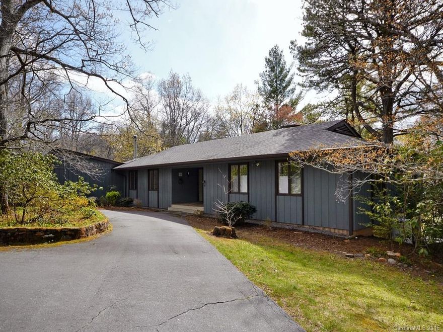 Private paradise best describes this unique home. You will Love the.Mid Century Modern Design. Nature provides the perfect backdrop through the wall of windows as you enter, custom built-ins throughout, attached greenhouse for the gardener, oversized garage, and level pasture area with small creek for the Horses, kids , family or friends to enjoy .