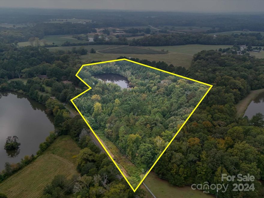 Discover your dream property! This beautiful +/-13-acre parcel of land offers unparalleled privacy and tranquility, surrounded by  greenery and featuring a picturesque man-made pond complete with a dam. Perfect for outdoor enthusiasts, the pond is stocked with fish, making it an ideal spot for fishing and enjoying serene waterside moments.

Imagine building your dream home here, where you can wake up to the sounds of nature and take in breathtaking views. Whether you're looking to create a peaceful retreat or a family residence, this expansive land provides plenty of space for your vision.

Conveniently located yet secluded, this property offers the perfect balance of privacy and accessibility. Don’t miss your chance to own this incredible piece of paradise for $350,000. Your dream lifestyle awaits!